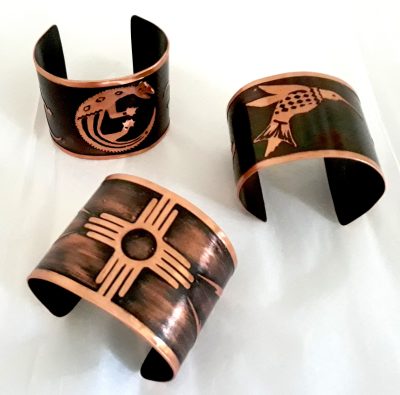 Copper cuffs with etched Mimbres Indian designs by Diane Kenny